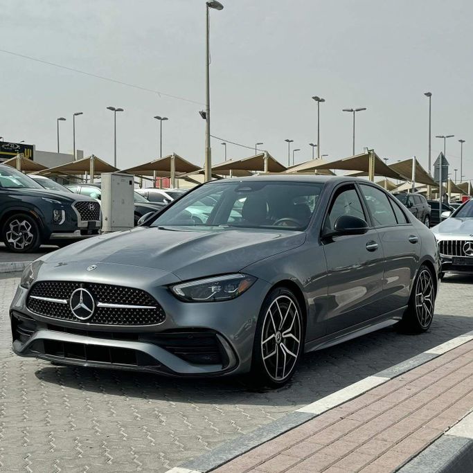 Подержанный Mercedes-Benz C-Class 300 V (W206), 2.0 л, 2022 в Шардже от Alfaris Used Cars Серый цвет. Other | AUTO.AE