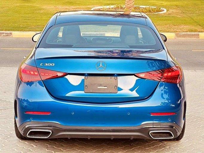 Подержанный Mercedes-Benz C-Class 300 V (W206), 2.0 л, 2023 в Шардже от Taj Al Sultan Used Cars Синий цвет. Other | AUTO.AE