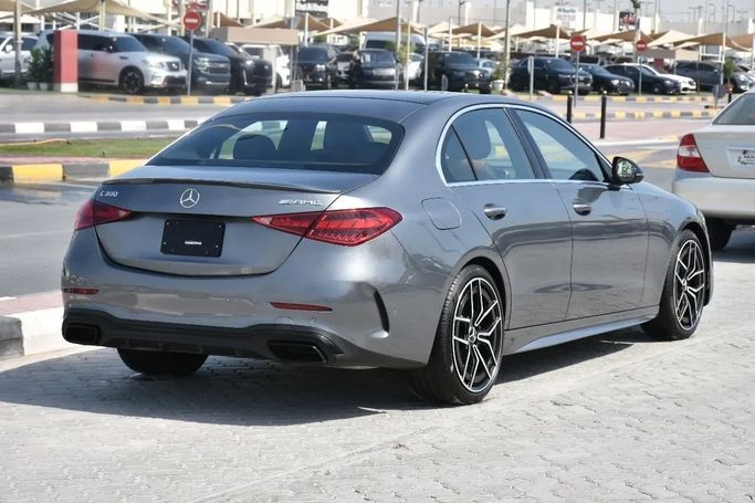 Подержанный Mercedes-Benz C-Class 300 V (W206), 2.0 л, 2022 в Шардже от Alfaris Used Cars Серый цвет. Other | AUTO.AE