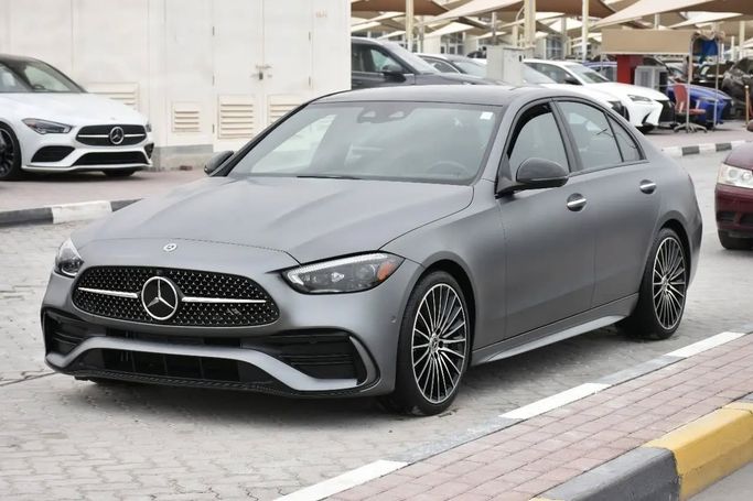 Подержанный Mercedes-Benz C-Class 300 V (W206), 2.0 л, 2022 в Шардже от Alfaris Used Cars Серый цвет. Other | AUTO.AE
