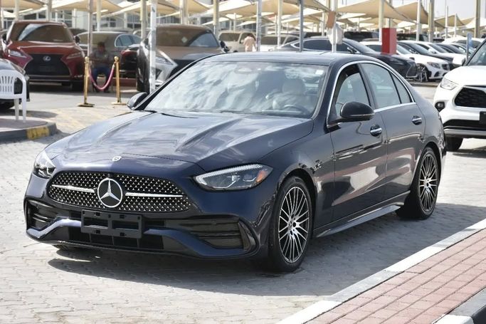 Подержанный Mercedes-Benz C-Class 300 V (W206), 2.0 л, 2022 в Шардже от Alfaris Used Cars Синий цвет. Other | AUTO.AE