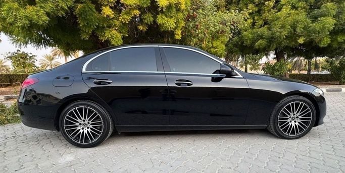 Used Mercedes-Benz C-Class 300 V (W206), 2.0 l, 2022 in Sharjah by Titanium Used Cars, Black color. American Specs | AUTO.AE