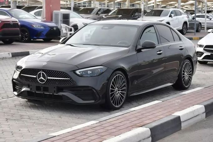 Подержанный Mercedes-Benz C-Class 200 V (W206), 1.5 л, 2022 в Шардже от Alfaris Used Cars Серый цвет. Other | AUTO.AE