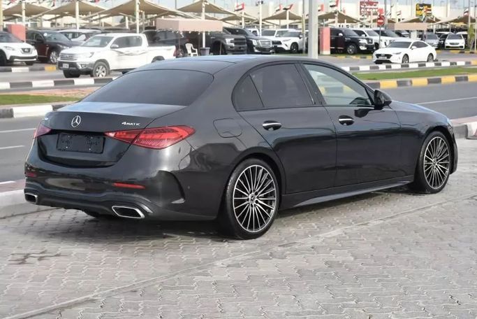 Подержанный Mercedes-Benz C-Class 200 V (W206), 1.5 л, 2022 в Шардже от Alfaris Used Cars Серый цвет. Other | AUTO.AE