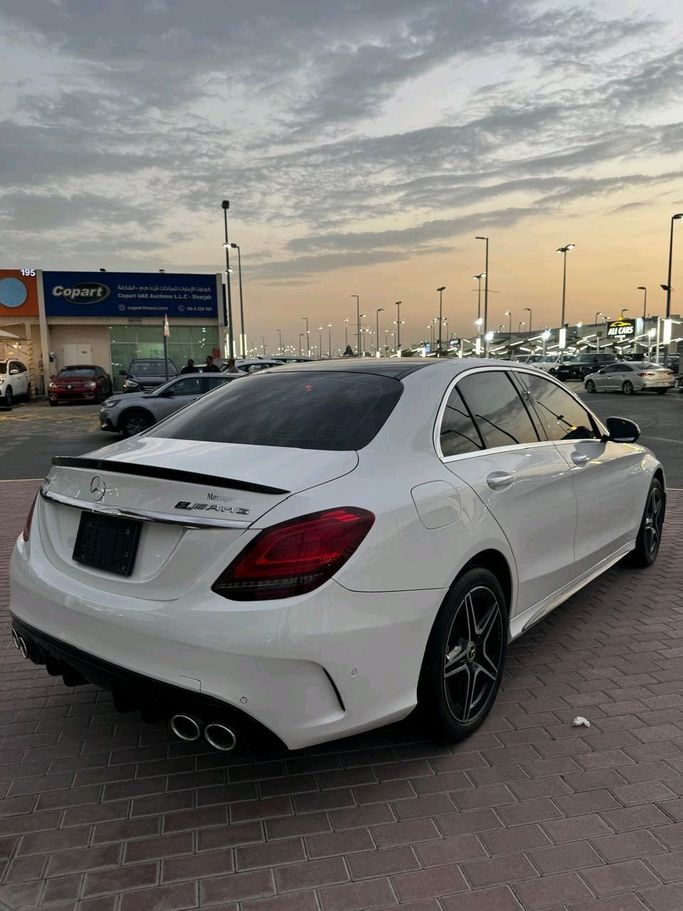 Used Mercedes-Benz C-Class 300 IV (W205) Facelift, 2.0 l, 2020 in Sharjah by Daira Used Cars, White color. American Specs | AUTO.AE