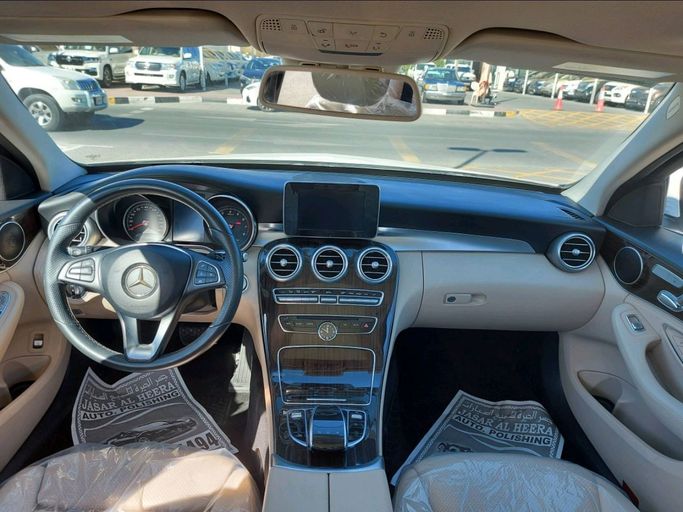 Used Mercedes-Benz C-Class 300 IV (W205), 2.0 l, 2016 in Sharjah by Daira Used Cars, White color. American Specs | AUTO.AE
