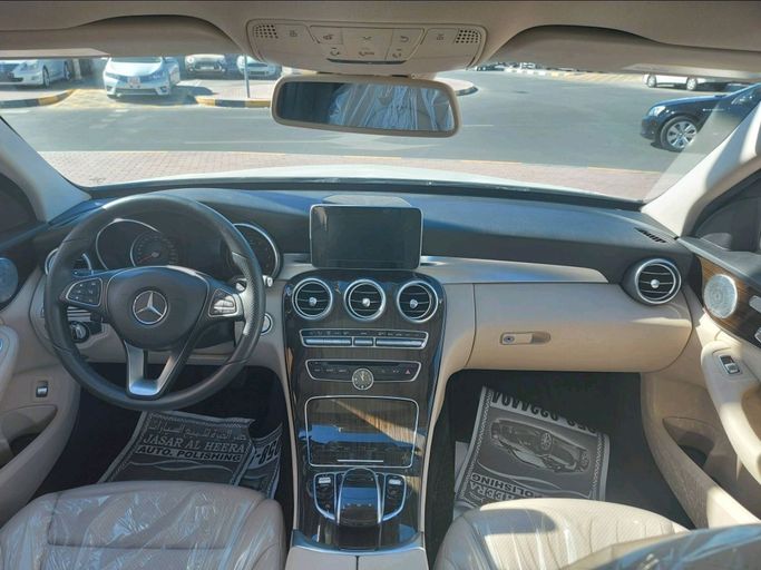 Used Mercedes-Benz C-Class 300 IV (W205), 2.0 l, 2016 in Sharjah by Daira Used Cars, White color. American Specs | AUTO.AE