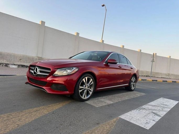 Used Mercedes-Benz C-Class 300 IV (W205), 2.0 l, 2016 in Sharjah by Laqtah Used Cars, Red color. American Specs | AUTO.AE