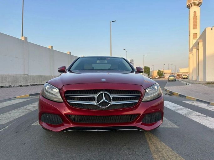 Used Mercedes-Benz C-Class 300 IV (W205), 2.0 l, 2016 in Sharjah by Laqtah Used Cars, Red color. American Specs | AUTO.AE