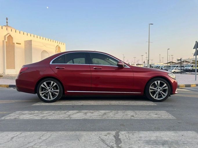 Used Mercedes-Benz C-Class 300 IV (W205), 2.0 l, 2016 in Sharjah by Laqtah Used Cars, Red color. American Specs | AUTO.AE