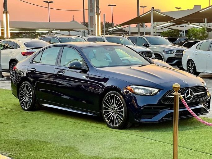 Used Mercedes-Benz C-Class 300 V (W206), 2.0 l, 2023 in Sharjah by Ali Abood Used Cars, Blue color. American Specs | AUTO.AE
