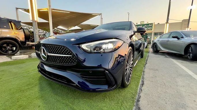 Used Mercedes-Benz C-Class 300 V (W206), 2.0 l, 2023 in Sharjah by Ali Abood Used Cars, Blue color. American Specs | AUTO.AE