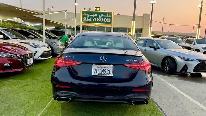 Used Mercedes-Benz C-Class 300 V (W206), 2.0 l, 2023 in Sharjah by Ali Abood Used Cars, Blue color. American Specs | AUTO.AE