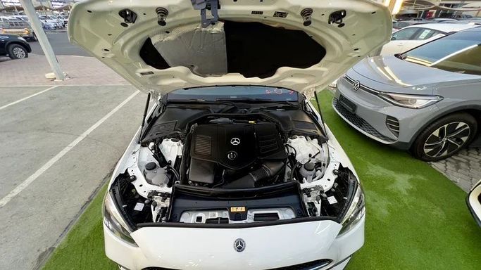 Used Mercedes-Benz C-Class 300 V (W206), 2.0 l, 2022 in Sharjah by Ali Abood Used Cars, White color. American Specs | AUTO.AE