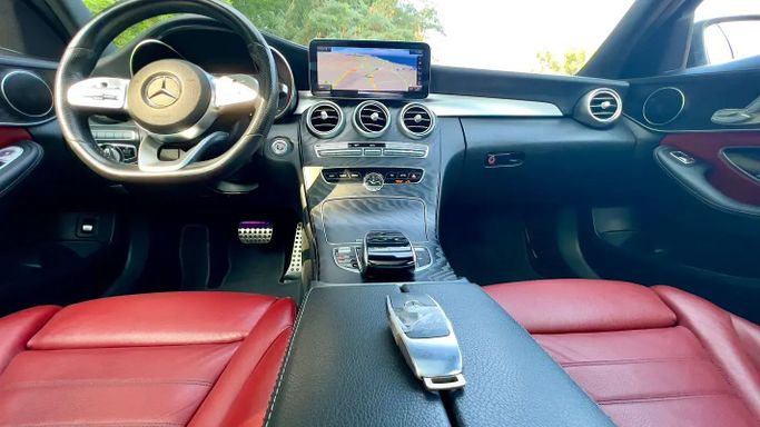 Used Mercedes-Benz C-Class 200 IV (W205) Facelift, 2.0 l, 2020 in Sharjah by Ali Abood Used Cars, White color. GCC Specs | AUTO.AE