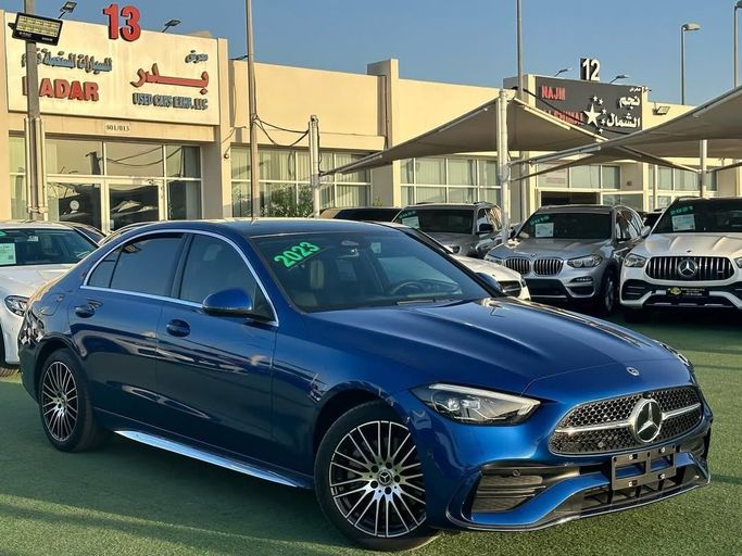 Подержанный Mercedes-Benz C-Class 260 L V (W206), 1.5 л, 2023 в Шардже от Badar Used Cars Тёмно-синий цвет.  | AUTO.AE