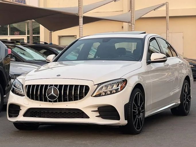 Used Mercedes-Benz C-Class 300 IV (W205) Facelift, 2.0 l, 2019 in Sharjah by Al Nukhba Al Malakyah Used Cars, White color. American Specs | AUTO.AE