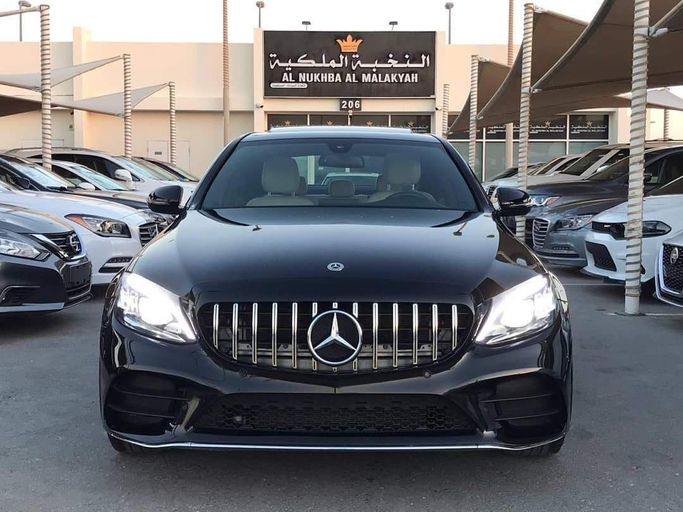Used Mercedes-Benz C-Class 300 IV (W205), 2.0 l, 2018 in Sharjah by Al Nukhba Al Malakyah Used Cars, Black color. American Specs | AUTO.AE