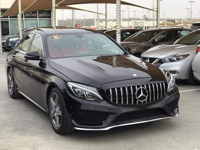 Used Mercedes-Benz C-Class 300 IV (W205), 2.0 l, 2015 in Sharjah by Al Nukhba Al Malakyah Used Cars, Black color. American Specs | AUTO.AE