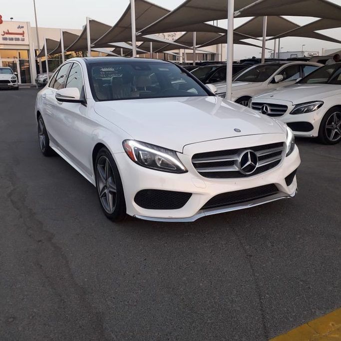 Used Mercedes-Benz C-Class 300 IV (W205), 2.0 l, 2016 in Sharjah by Badar Used Cars, White color.  | AUTO.AE