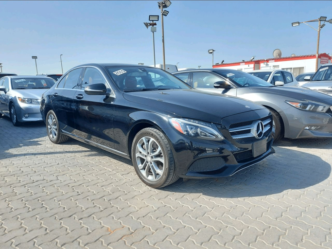 Used Mercedes-Benz C-Class 300 IV (W205), 2.0 l, 2015 in Sharjah by Al Madar, Black color. American Specs | AUTO.AE