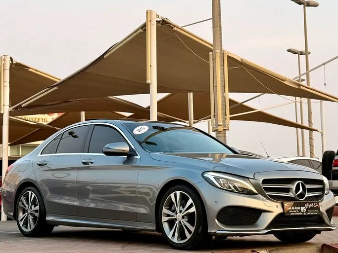 Подержанный ⁦Mercedes-Benz C-Class 300 IV (W205), 2.0 л, 2016⁩ в ОАЭ, Шарджа от Wael Al Azzazi Used Cars Серебристый цвет. GCC | AUTO.AE | Объявление #287738
