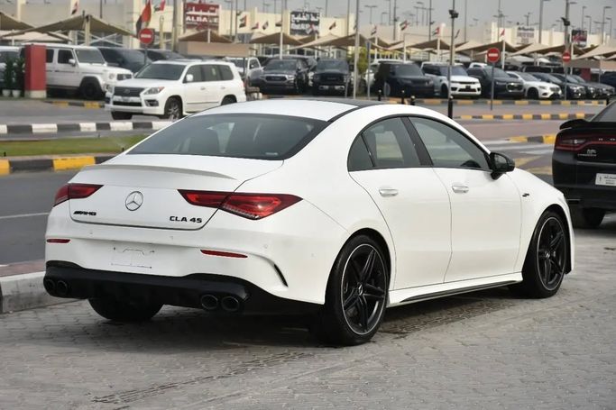 Подержанный Mercedes-Benz CLA AMG 45 AMG II (C118, X118), 2.0 л, 2023 в Шардже от Alfaris Used Cars Белый цвет. Other | AUTO.AE