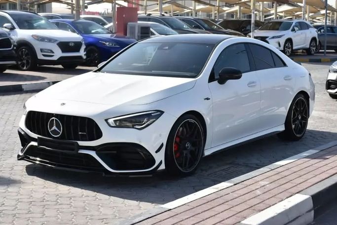 Подержанный Mercedes-Benz CLA AMG 45 AMG II (C118, X118), 2.0 л, 2023 в Шардже от Alfaris Used Cars Белый цвет. Other | AUTO.AE