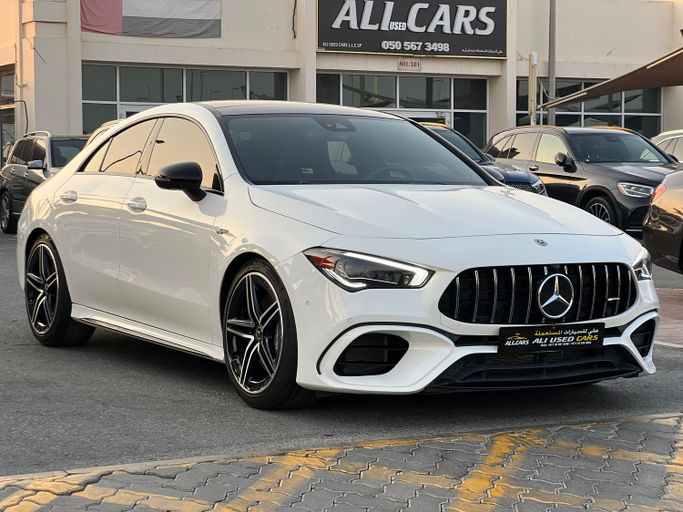 Used Mercedes-Benz CLA AMG 45 AMG II (C118, X118), 2.0 l, 2021 in Sharjah by Ali Used Cars, White color. American Specs | AUTO.AE