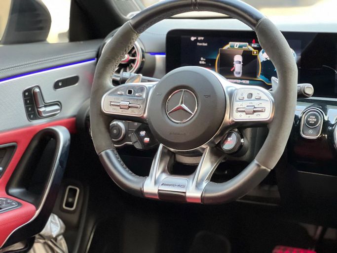 Used Mercedes-Benz CLA AMG 45 AMG II (C118, X118), 2.0 l, 2021 in Sharjah by Ali Used Cars, White color. American Specs | AUTO.AE