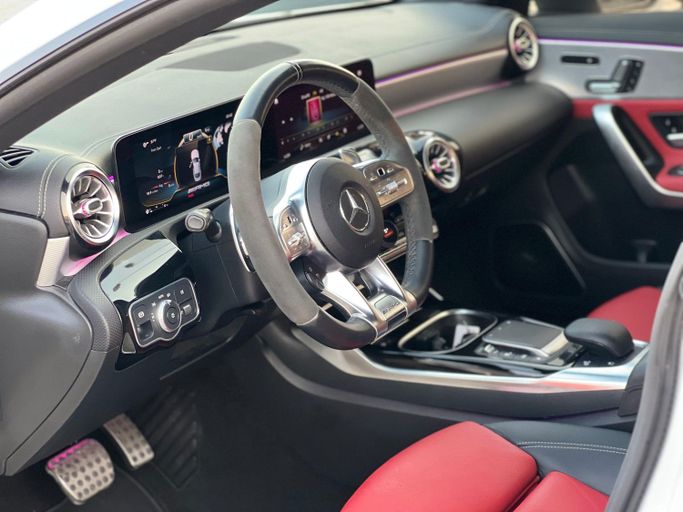 Used Mercedes-Benz CLA AMG 45 AMG II (C118, X118), 2.0 l, 2021 in Sharjah by Ali Used Cars, White color. American Specs | AUTO.AE