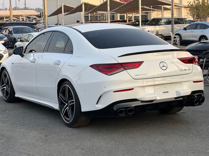Used Mercedes-Benz CLA AMG 45 AMG II (C118, X118), 2.0 l, 2021 in Sharjah by Ali Used Cars, White color. American Specs | AUTO.AE