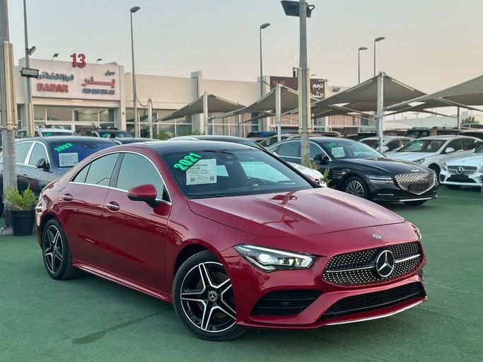 Подержанный Mercedes-Benz CLA 250 II (C118, X118), 2.0 л, 2021 в Шардже от Badar Used Cars Тёмно-бордовый цвет.  | AUTO.AE