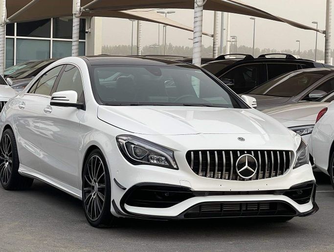 Used Mercedes-Benz CLA 250 I (C117, X117) Facelift, 2.0 l, 2018 in Sharjah by Al Nukhba Al Malakyah Used Cars, White color. American Specs | AUTO.AE