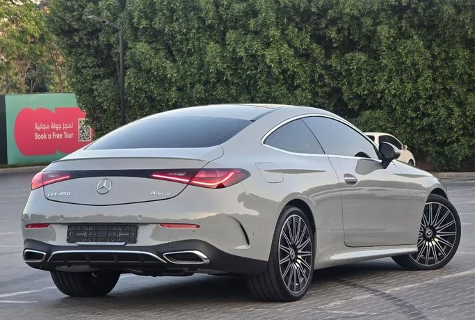 Подержанный Mercedes-Benz CLE 450, 3.0 л, 2025 в Шардже от Al Jana Used Cars Серый цвет. Корейская | AUTO.AE
