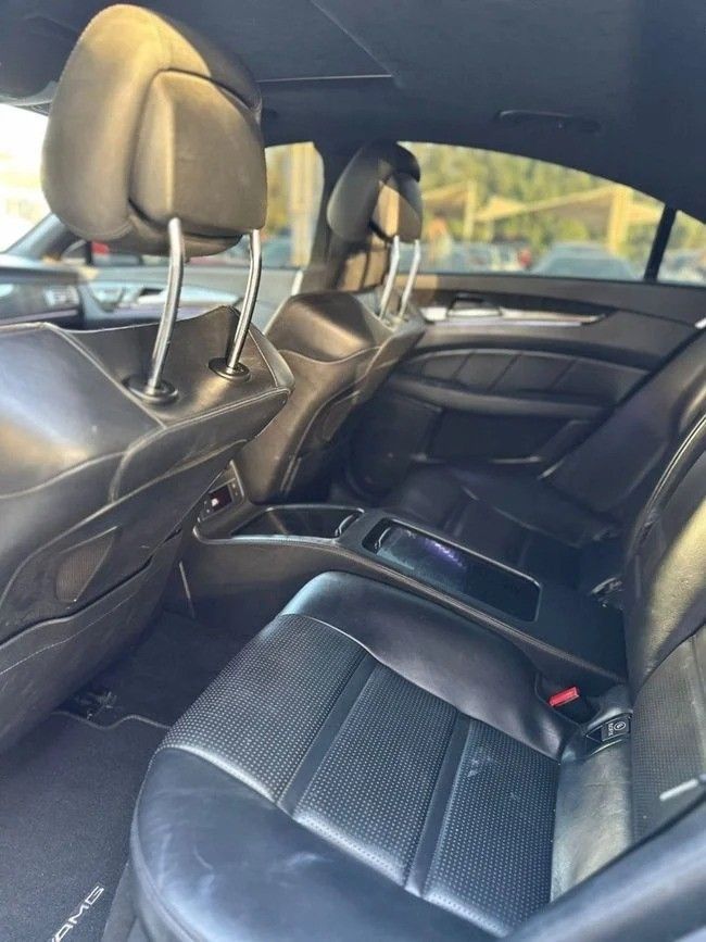 Подержанный Mercedes-Benz CLS AMG 63 AMG S II (W218), 5.5 л, 2012 в Шардже от Noor Al Seyoh Used Cars Белый цвет. Японская | AUTO.AE