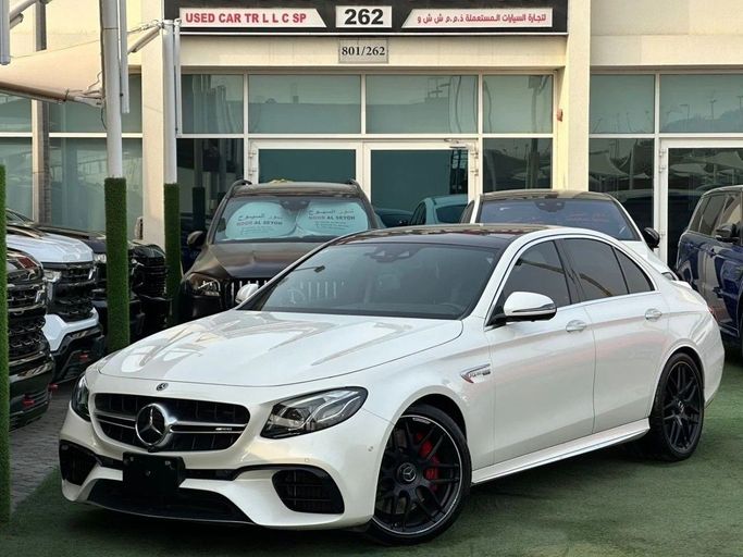 Подержанный Mercedes-Benz E-Class AMG 63 AMG S V (W213), 4.0 л, 2018 в Шардже от Noor Al Seyoh Used Cars Белый цвет. Японская | AUTO.AE