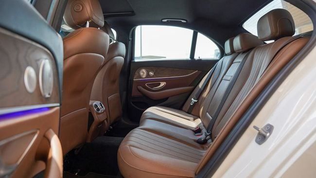 Used Mercedes-Benz E-Class 300 V (W213, S213, C238), 2.0 l, 2018 in Sharjah by Alnujoom Al Malakiah Used Cars, White color. Other | AUTO.AE