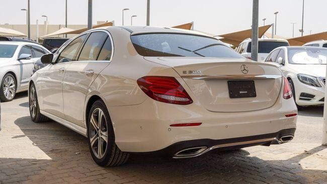 Used Mercedes-Benz E-Class 300 V (W213, S213, C238), 2.0 l, 2018 in Sharjah by Alnujoom Al Malakiah Used Cars, White color. Other | AUTO.AE