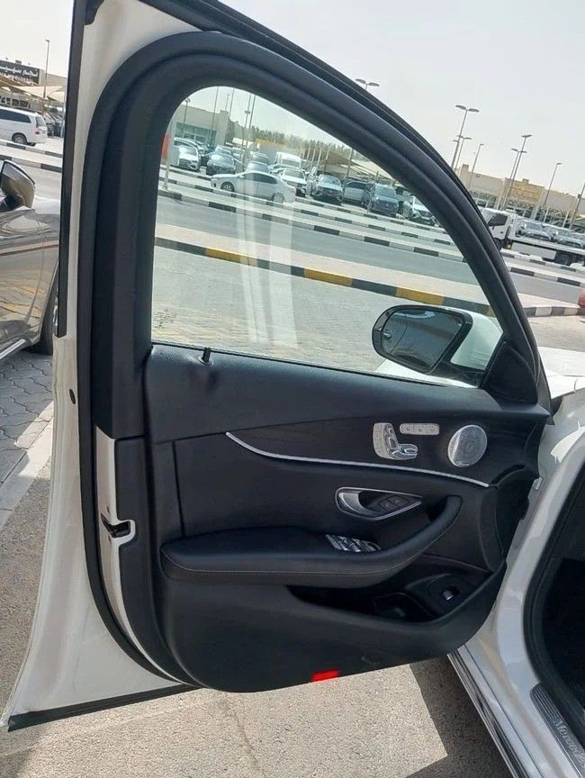 Used Mercedes-Benz E-Class 300 V (W213, S213, C238), 2.0 l, 2018 in Sharjah by Alnawras Cars, White color. Korean Specs | AUTO.AE
