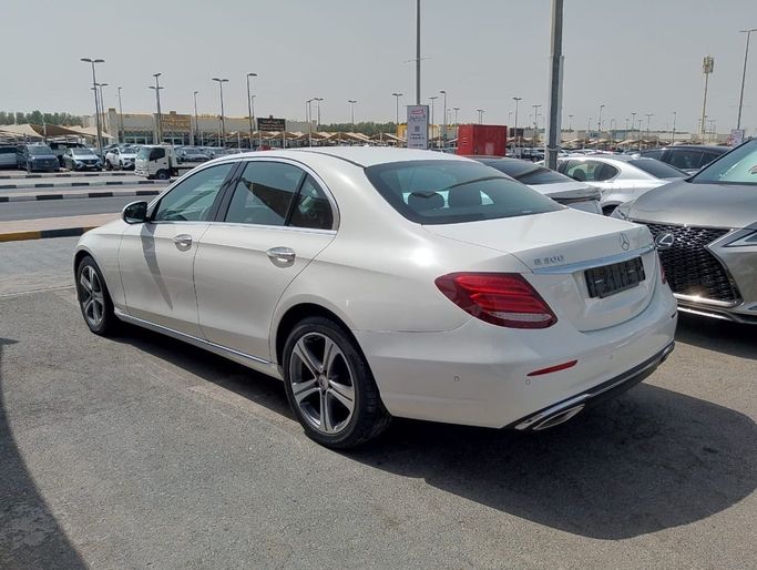 Used Mercedes-Benz E-Class 300 V (W213, S213, C238), 2.0 l, 2018 in Sharjah by Alnawras Cars, White color. Korean Specs | AUTO.AE