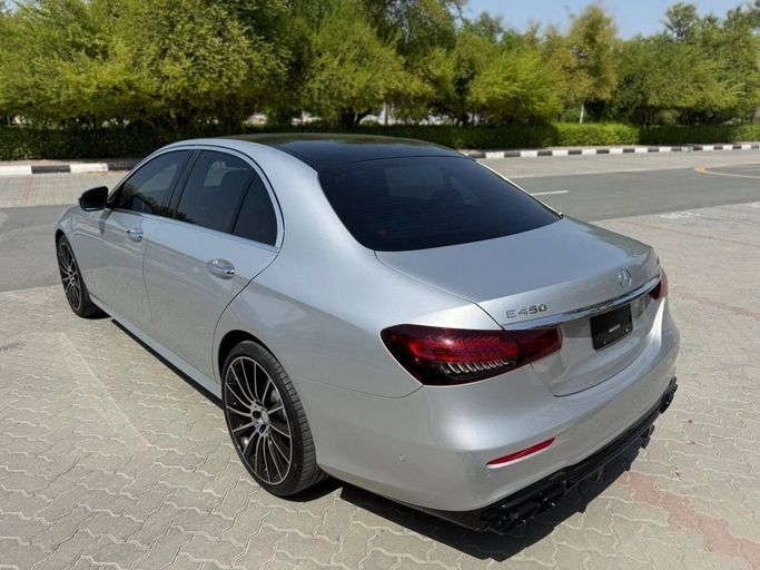 Used Mercedes-Benz E-Class 450 V (W213, S213, C238) Facelift, 3.0 l, 2020 in Sharjah by Alnawras Cars, Silver color.  | AUTO.AE
