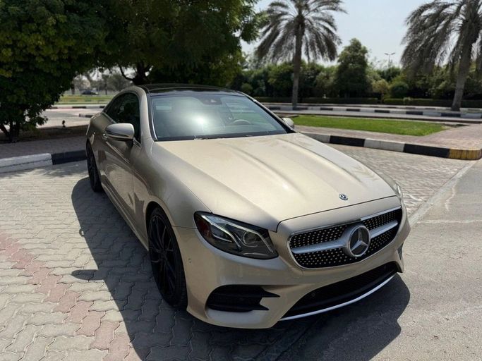 Used Mercedes-Benz E-Class 450 V (W213, S213, C238), 3.0 l, 2018 in Sharjah by Alnawras Cars, Golden color.  | AUTO.AE