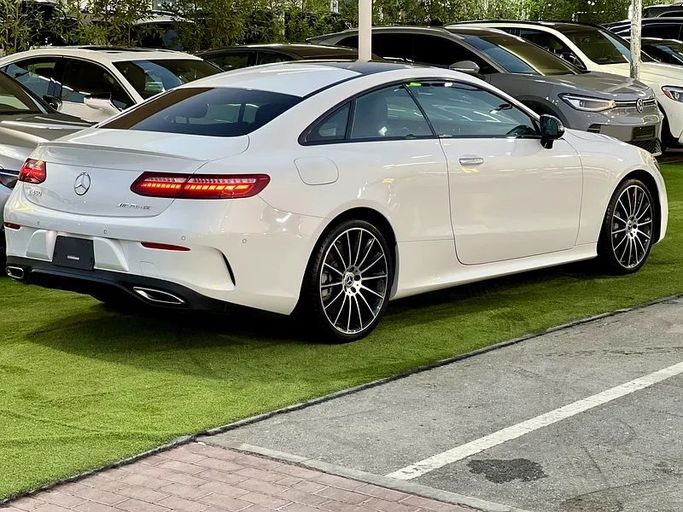 Used Mercedes-Benz E-Class 450 V (W213, S213, C238) Facelift, 3.0 l, 2023 in Sharjah by Ali Abood Used Cars, White color. American Specs | AUTO.AE