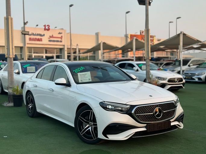 Used Mercedes-Benz E-Class 300 VI (W214, S214), 2.0 l, 2024 in Sharjah by Badar Used Cars, White color.  | AUTO.AE