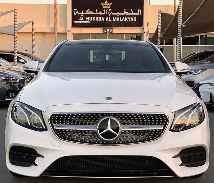 Used Mercedes-Benz E-Class 350 V (W213, S213, C238), 2.0 l, 2020 in Sharjah by Al Nukhba Al Malakyah Used Cars, White color. Korean Specs | AUTO.AE