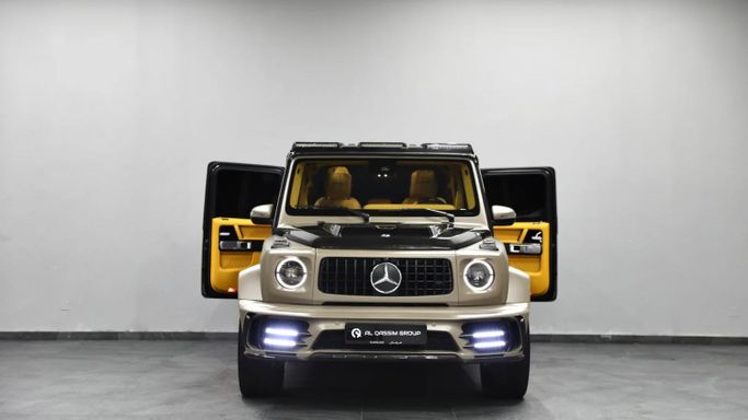 Подержанный Mercedes-Benz G-Class AMG 63 AMG II (W463), 4.0 л, 2019 в Шардже от Al Qassem Cars Trading Золотистый цвет. Американская | AUTO.AE