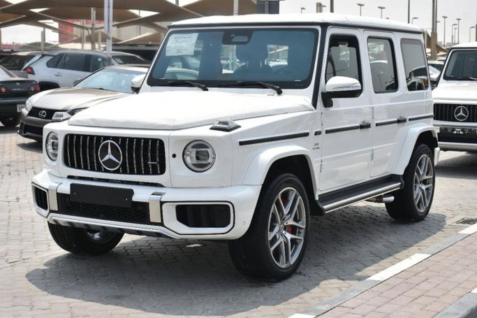 Новый Mercedes-Benz G-Class AMG 63 AMG II (W465) Рестайлинг, 4.0 л, 2025 в Шардже от Alfaris Used Cars Белый цвет. Other | AUTO.AE