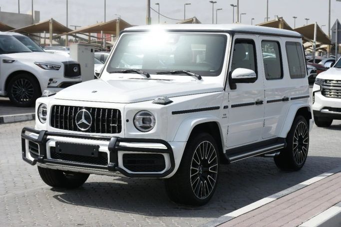 Подержанный Mercedes-Benz G-Class AMG 63 AMG II (W463), 4.0 л, 2024 в Шардже от Alfaris Used Cars Белый цвет. Other | AUTO.AE