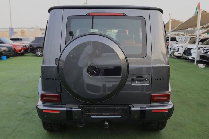 Новый Mercedes-Benz G-Class AMG 63 AMG II (W465) Рестайлинг, 4.0 л, 2024 в Шардже от Al Bake Used Cars Серый цвет.  | AUTO.AE